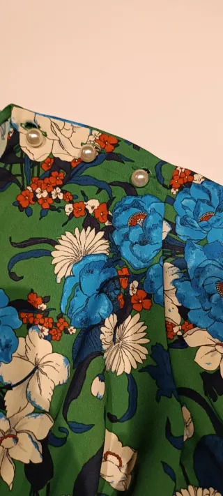 Blusa floreada manga acampanada 3/4