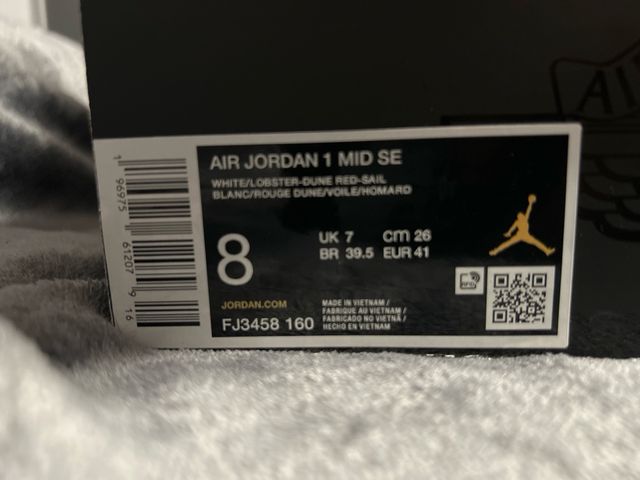 Jordan 1 Mid Bianche e Rosse