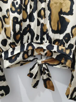 Maglia donna leopardata con fiocco