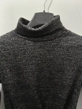 Maglia donna collo alto effetto lucido argentato