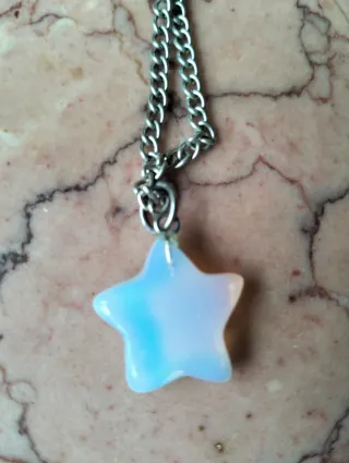 Colgante estrella azul y blanco