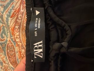 Pantaloni neri lucidi