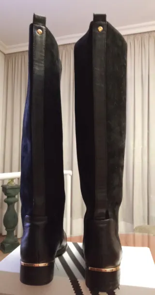 Botas altas negras de ante y piel