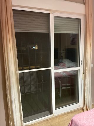 Ventana corredera aluminio con reja