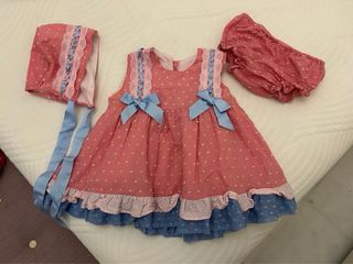 Jesusin niña rosa con volantes y lazos