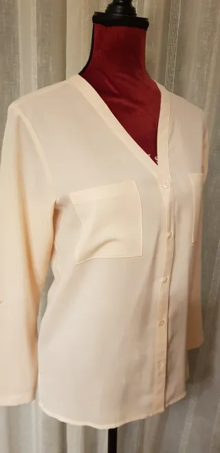 Blusa cuello pico salmón