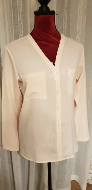 Blusa cuello pico salmón