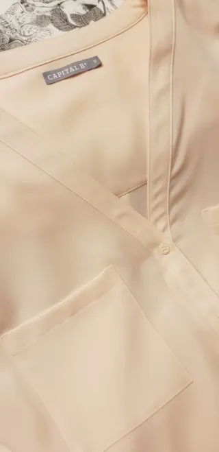 Blusa cuello pico salmón