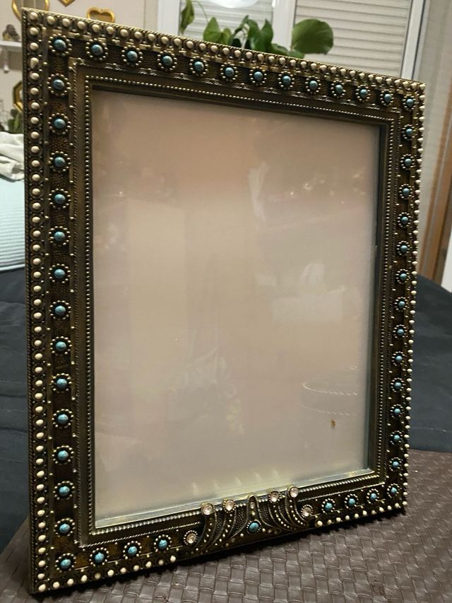 Marco de fotos y joyero decorado