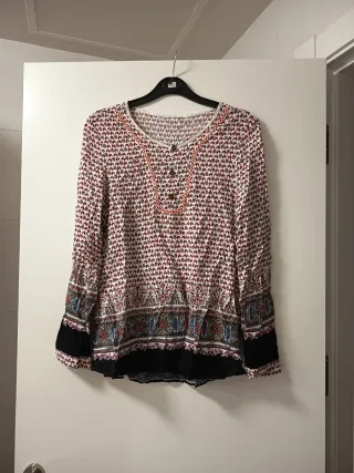 Blusa estampada manga larga