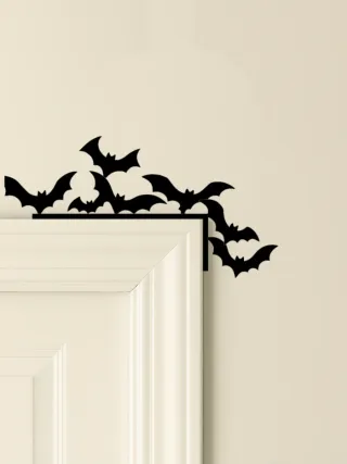 Gato decorativo negro para puerta