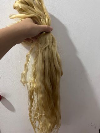 Extensiones de pelo rubio ondulado
