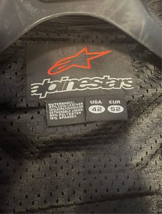 Mono de moto Alpinestars blanco y negro
