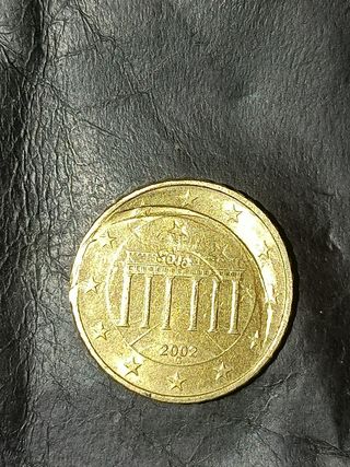 Moneda 10 céntimos error acuñación 2002