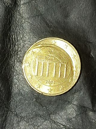 Moneda 10 céntimos error acuñación 2002