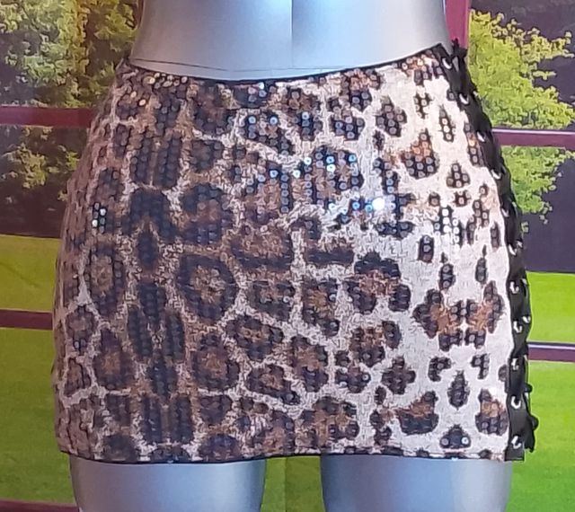 Mini gonna leopardata con anelli