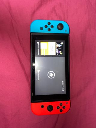 Nintendo Switch Azul/Rojo + Cargador + Juego