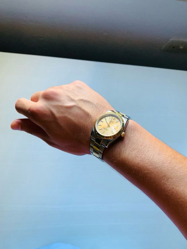 Reloj Rolex dorado y plateado