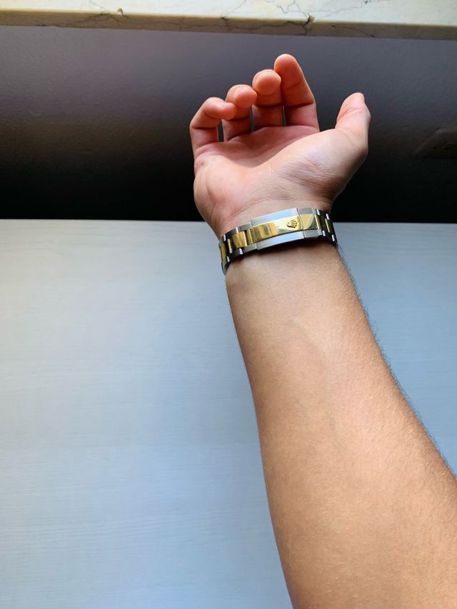 Reloj Rolex dorado y plateado