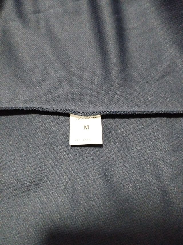 Chaqueta de punto azul y blanco