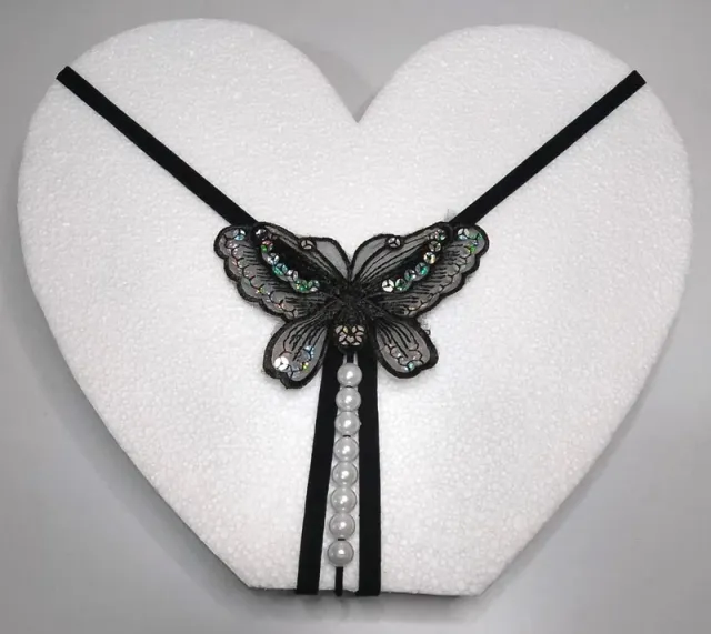 Tanga con farfalla centrale e paillettes