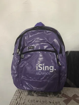 Mochila Morada iSing uDance Primaria