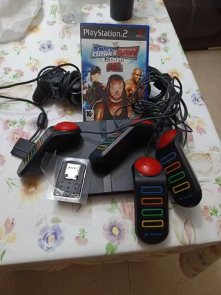 Consola PlayStation 2 + Juego WWE SmackDown