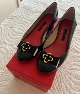 Bailarinas Carolina Herrera negras y doradas