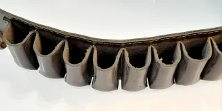 Canana cartuchera de 25 huecos 