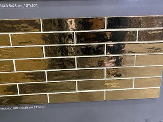 5x25 Porcelánico Lingo Oro Imitación.