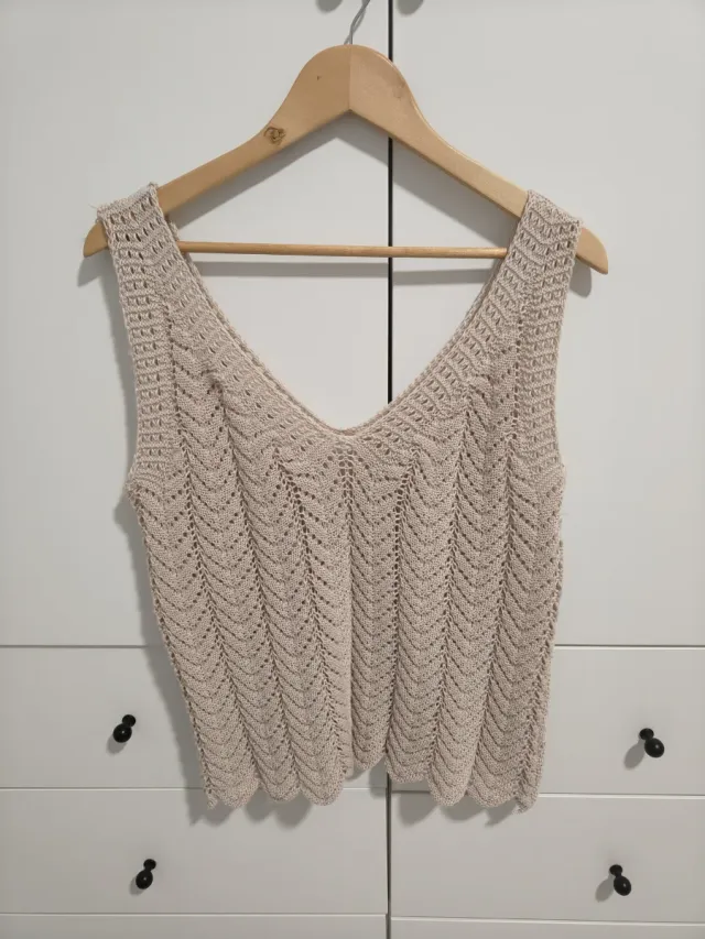Chaleco de punto beige. Solo envío