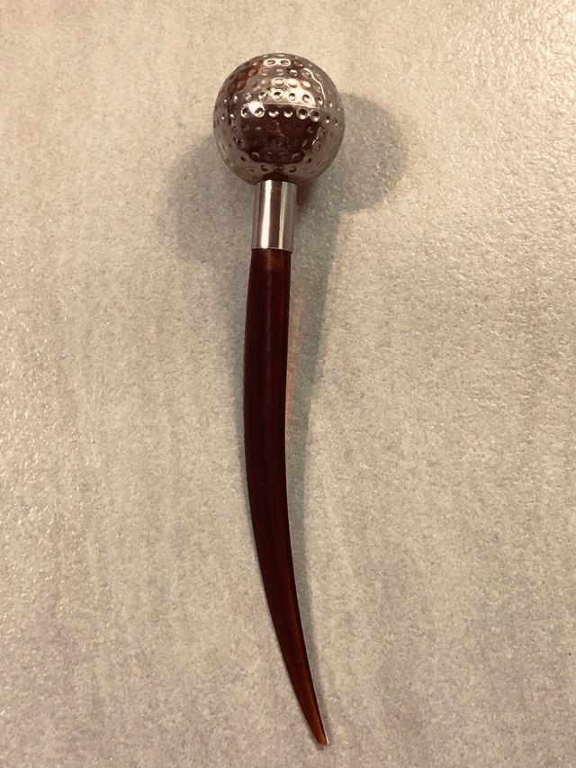 Tagliacarte vintage con testa di golf