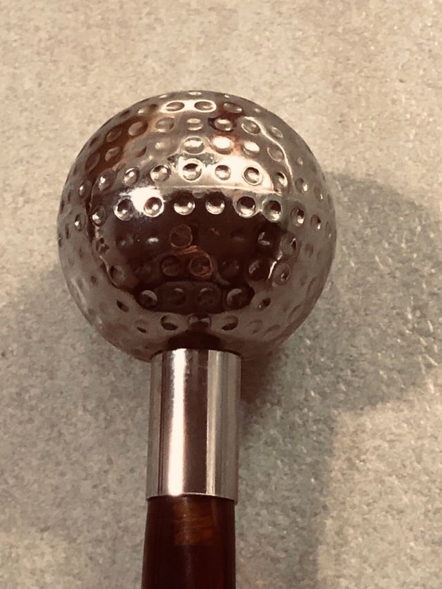 Tagliacarte vintage con testa di golf