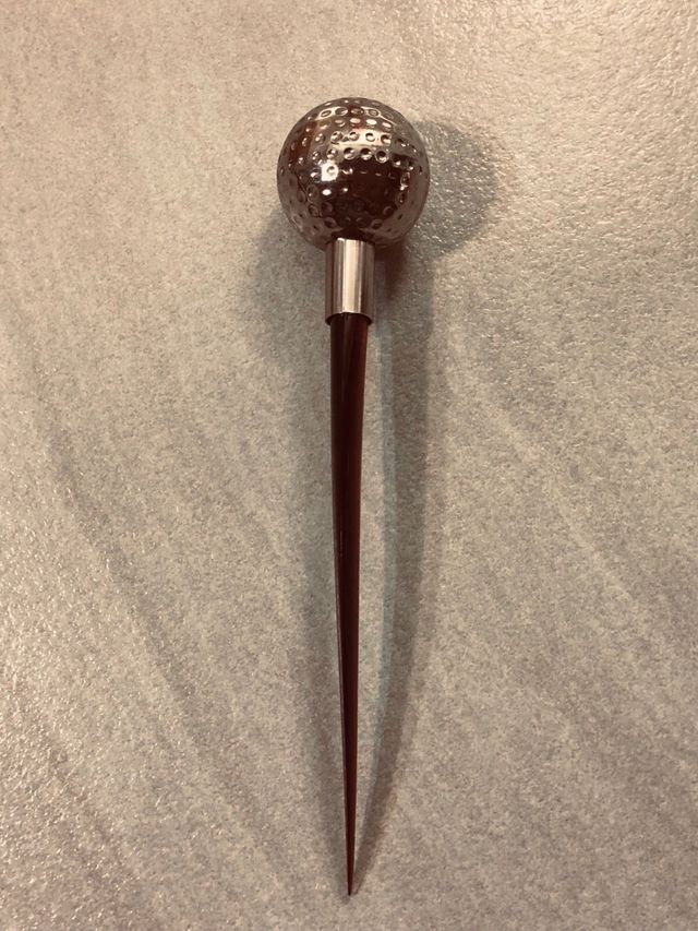 Tagliacarte vintage con testa di golf