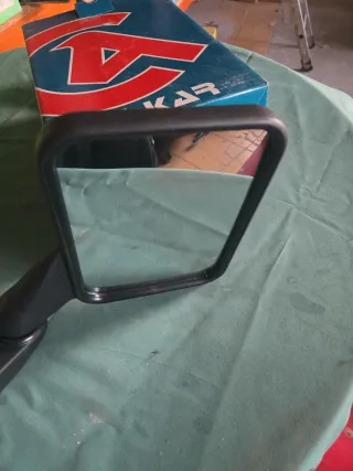 Espejo derecho Nissan Trade retrovisor 