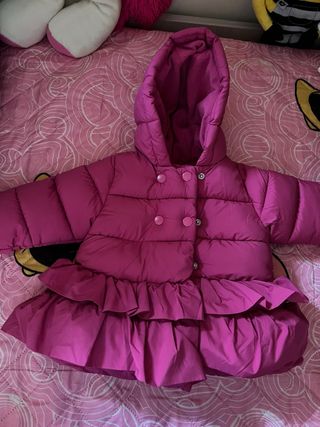 Piumino bambina fucsia con frange