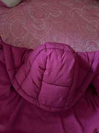 Piumino bambina fucsia con frange