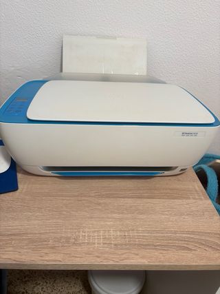 Impresora HP Azul y Blanca