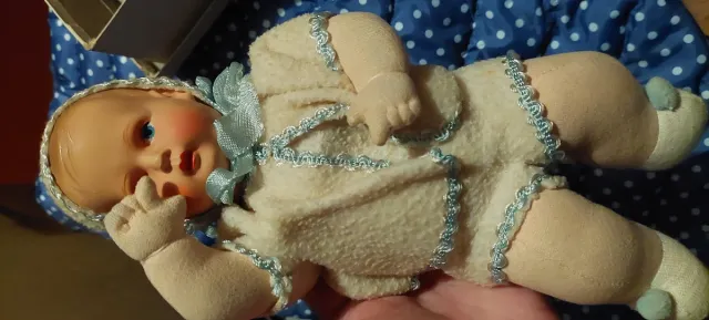 Bambola antica con meccanismo
