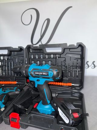 Trapano a percussione con valigetta accessori