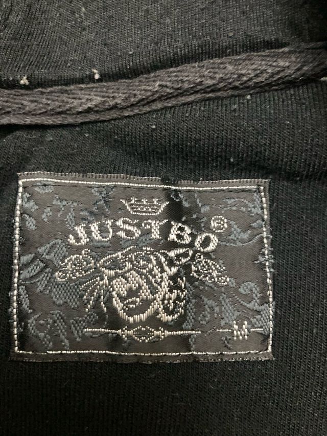 Sudadera con cremallera azul y negra