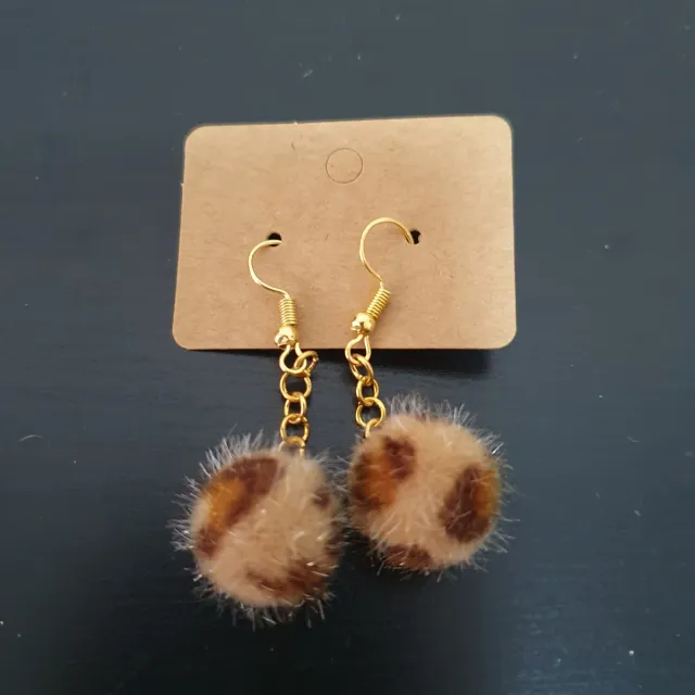 Pendientes pompón estampado animal