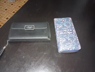 Monedero de mano negro 5€ cada uno