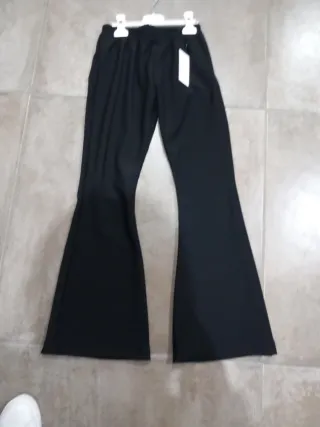 Pantaloni neri a zampa bimba 14 anni