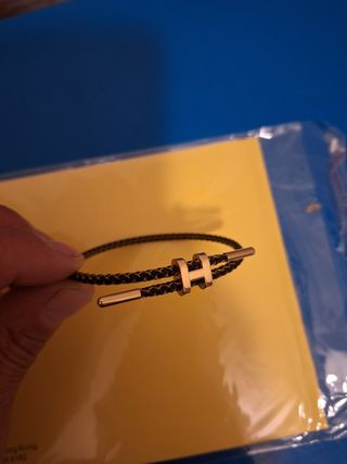 Bracciale H intrecciato oro e nero