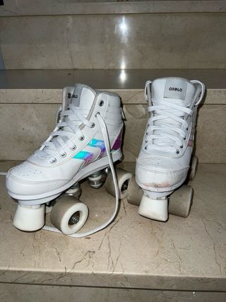 Patines artísticos blancos 4 ruedas
talla 33