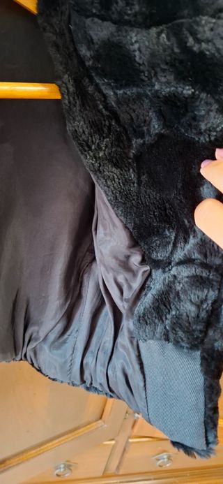 Pelliccia sintetica nera corta