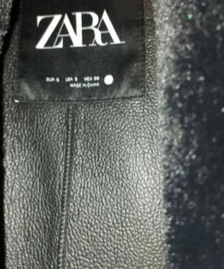 Abrigo pelo negro con forro piel