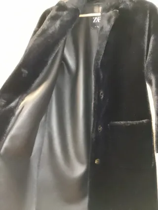 Abrigo pelo negro con forro piel