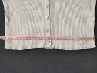 Chaquetita de punto blanca de Massimo Dutti